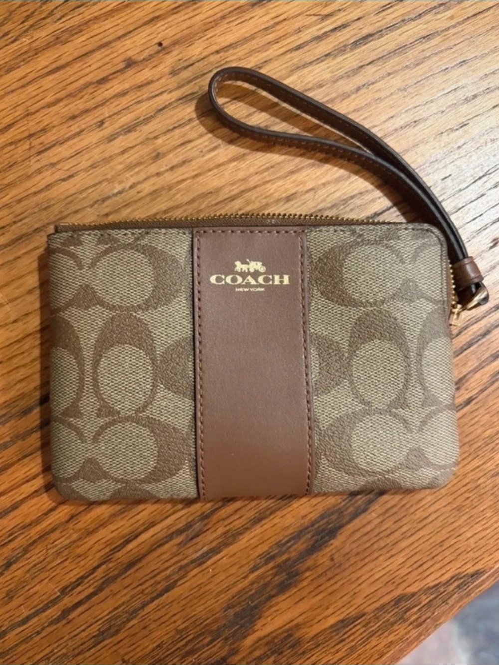 COACH Brown Signature Canvas Wristlet with Leather Center Stripe